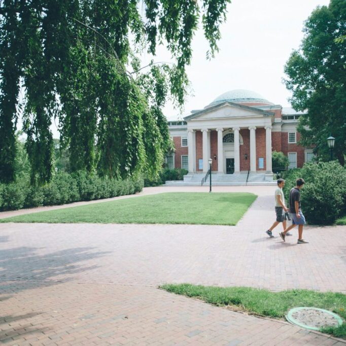 two people walking across university campus in chapel hill, nc