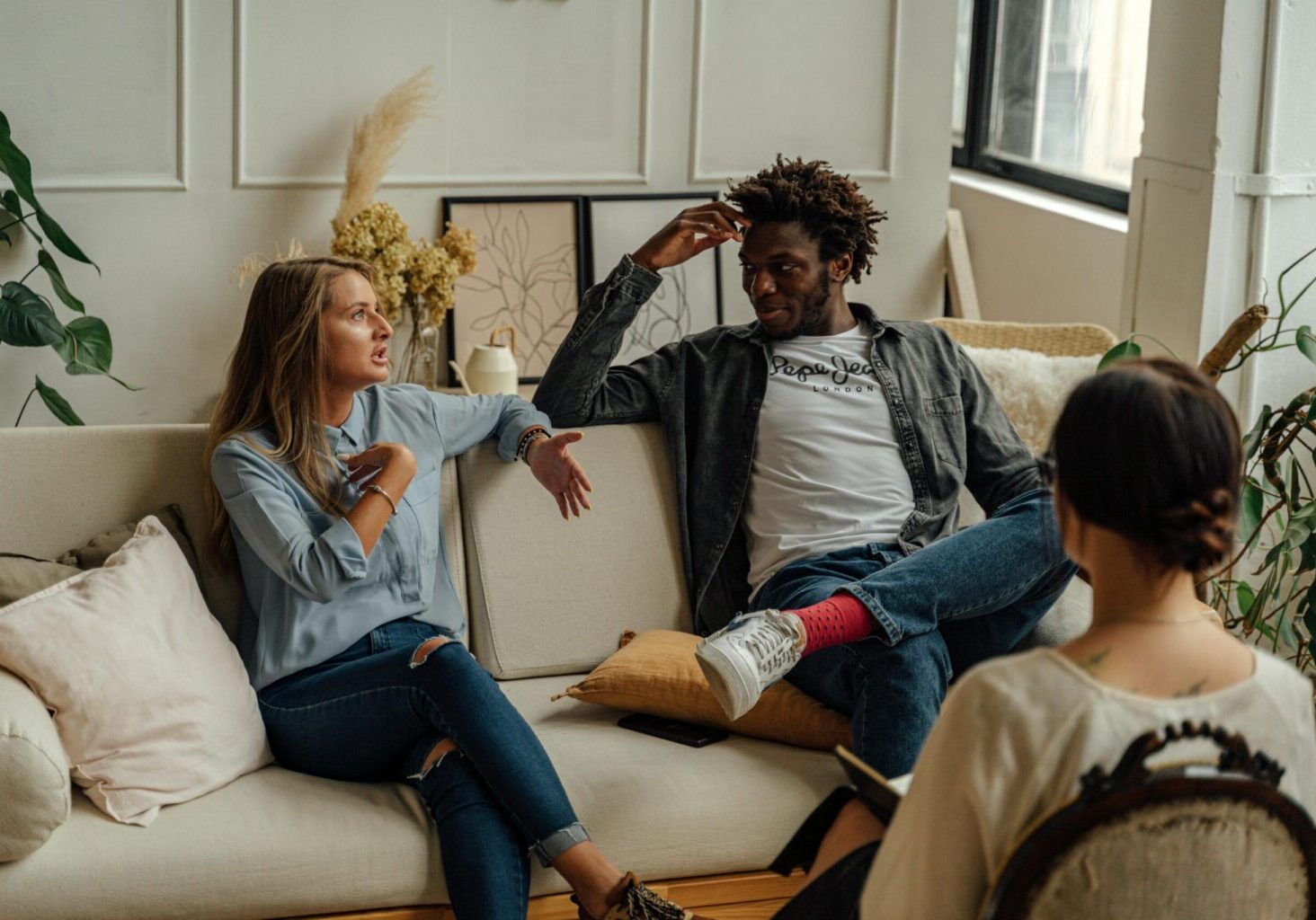 married couple discussing partner's infidelity in therapy raleigh nc