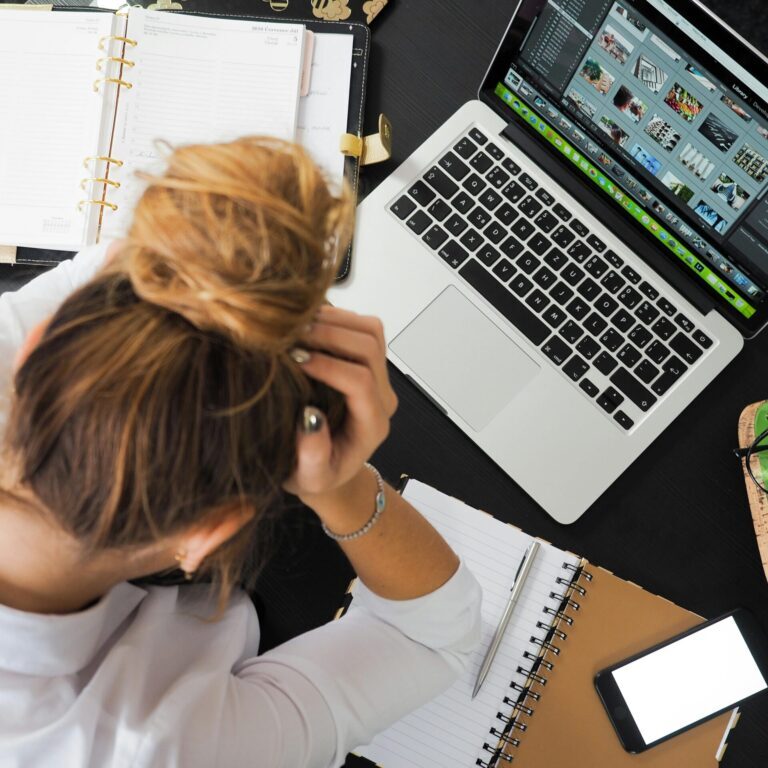 young frustrated adult at a desk